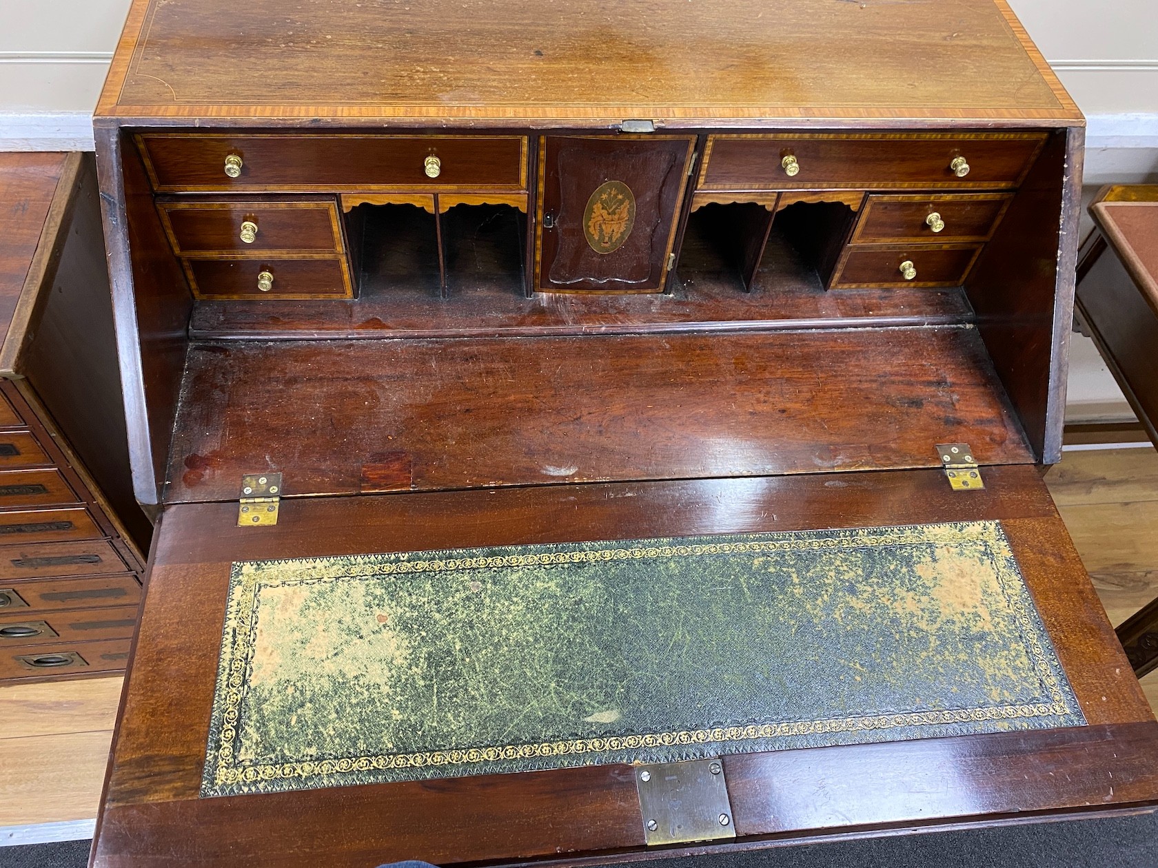 A George III mahogany bureau, later marquetry inlaid and crossbanded, width 91cm, depth 48cm, height 105cm